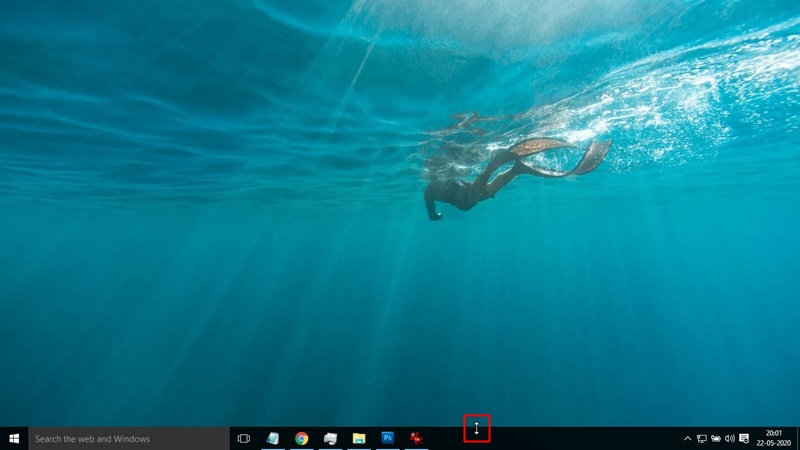 Position your mouse cursor on the edge of the Taskbar.